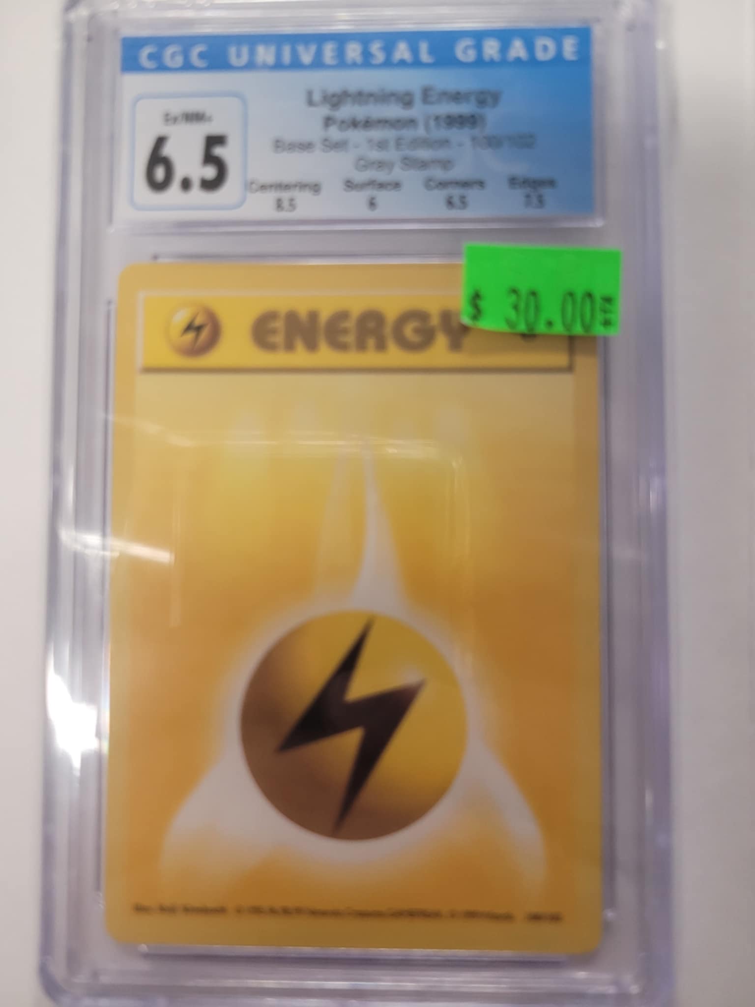 Lightning Energy Pokemon Base Set Gray Stamp CGC 6.5 | L.A. Mood Comics and Games