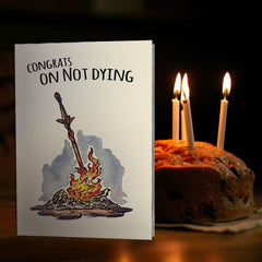 "Congrats on Not Dying" - Black Soul Birthday Card for Gamer | L.A. Mood Comics and Games