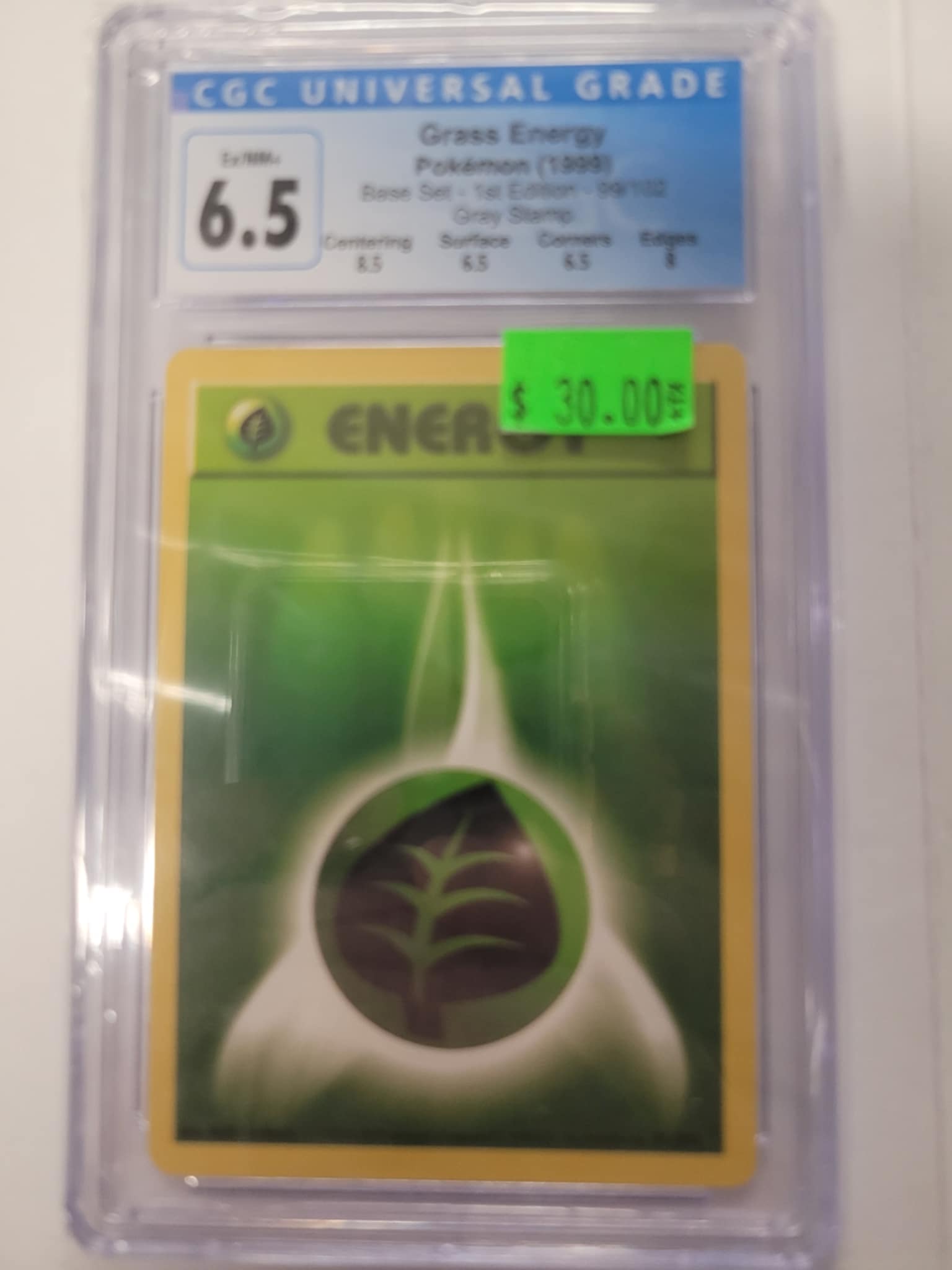 Grass Energy Pokemon Base Set 1999 CGC 6.5 | L.A. Mood Comics and Games